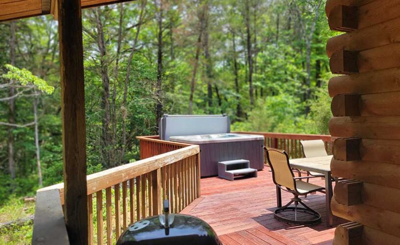 hot tub on the deck at whispering pines cabin in eureka springs